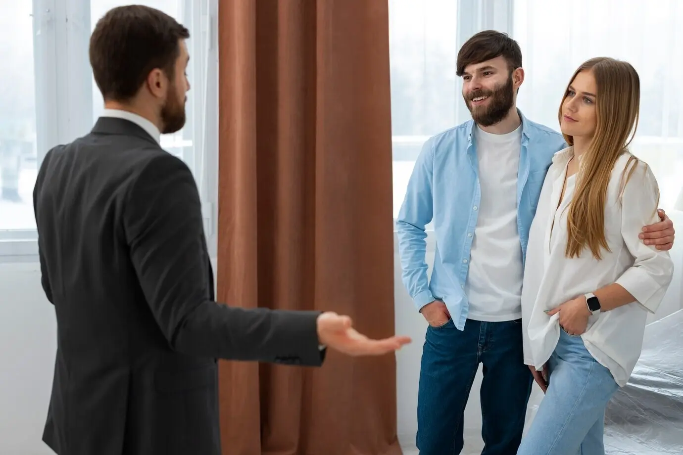 A real estate agent at work, showing a house and conducting business.